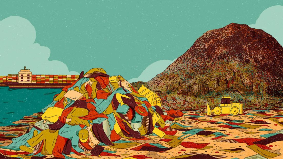 The image shows a landfill site with a large mound of clothing piled up. There is a cargo ship in the background.