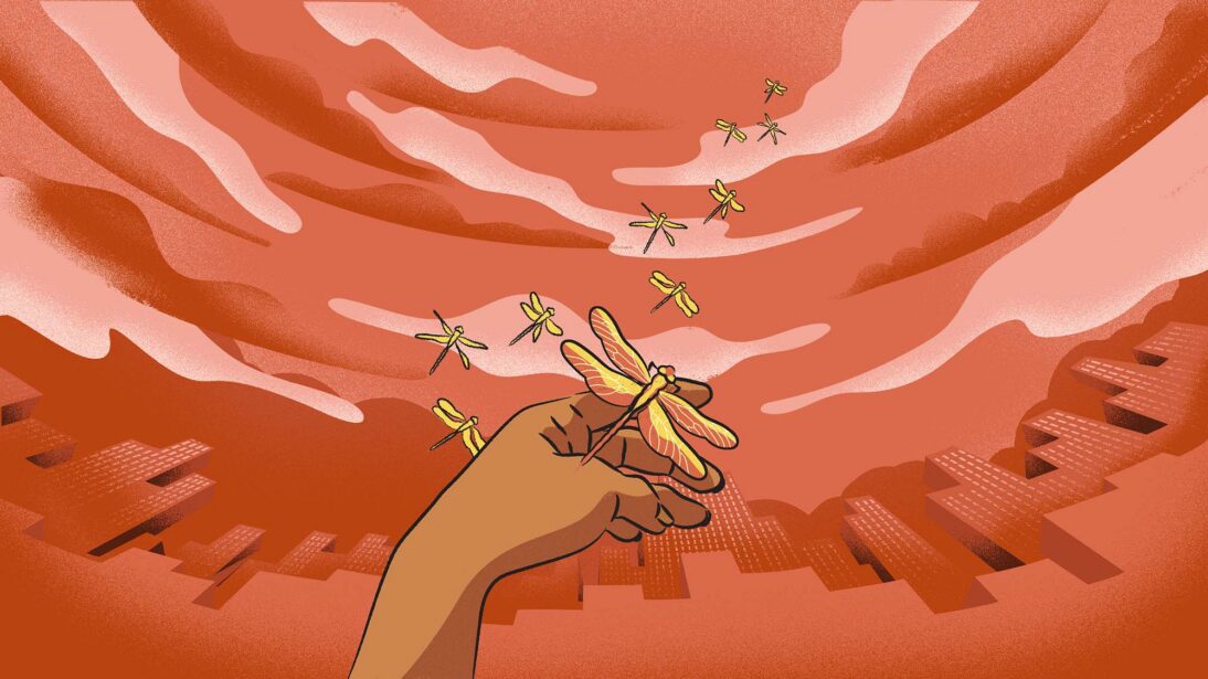 The image shows a hand holding a dragonfly. There is a cityscape behind and other yellow dragonflies flying upwards to the sky