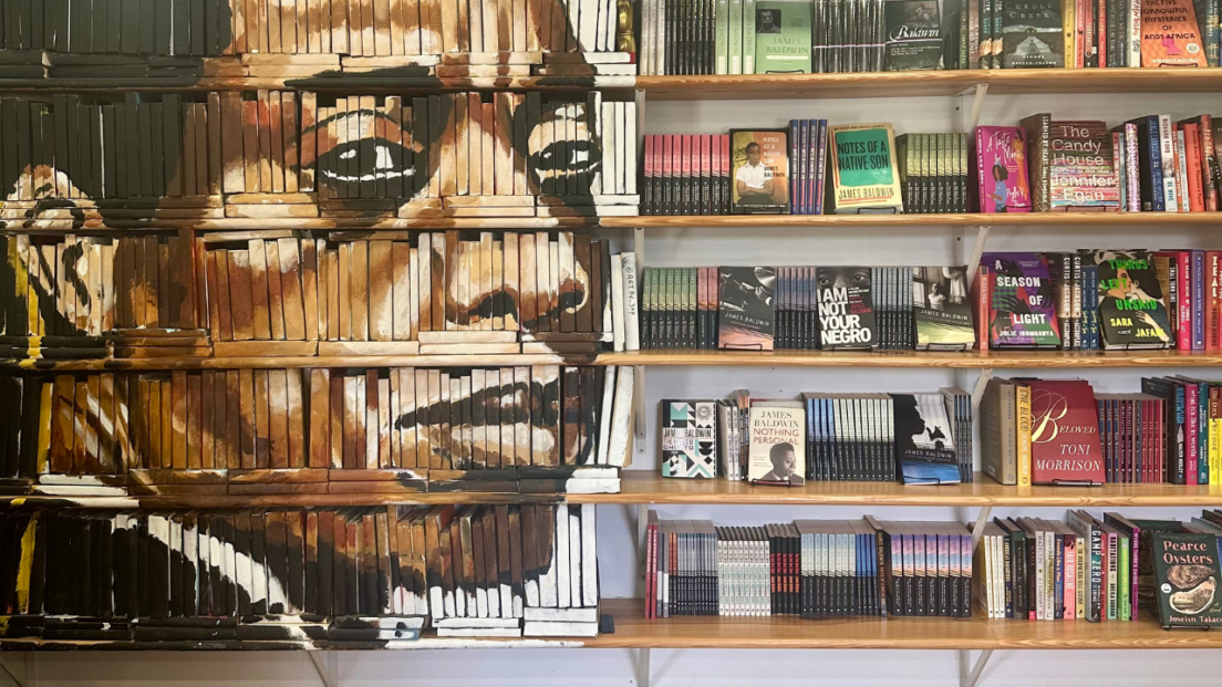 the image shows a crowded bookcase