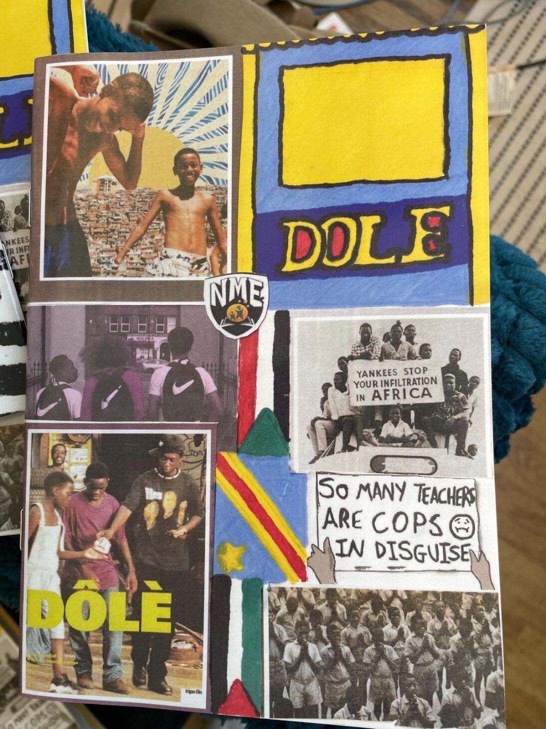 the image shows a zine that a young person has made about abolition. there are lots of different photos stick on and drawings decorated around it